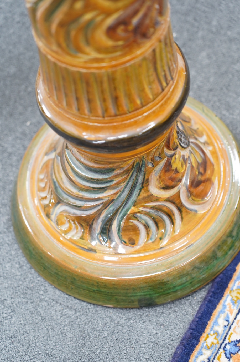 A terracotta jardiniere on stand with incised stylised floral decoration, 102cm high. Condition - good